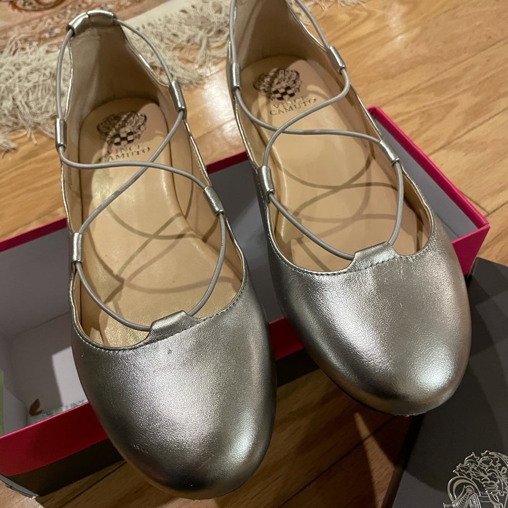 Silver ballet flats by Vince Camutk